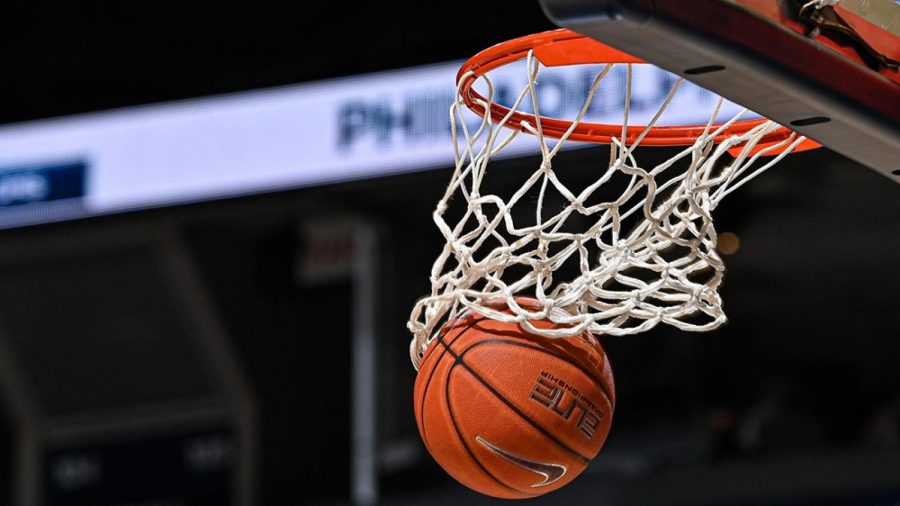 Olahraga Beregu Basket Dengan Memasukan Bola
